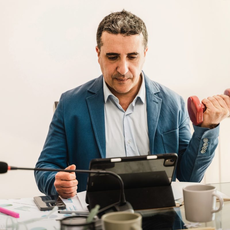 Businessman Multitasking - Fitness at Work